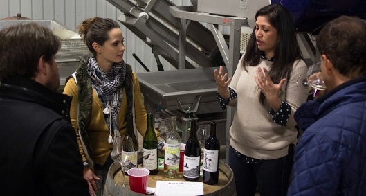 Brit Zotovich, left, and Anna Clifford discuss Dreamcôte Wine Co. with two writers at a private tasting in December.